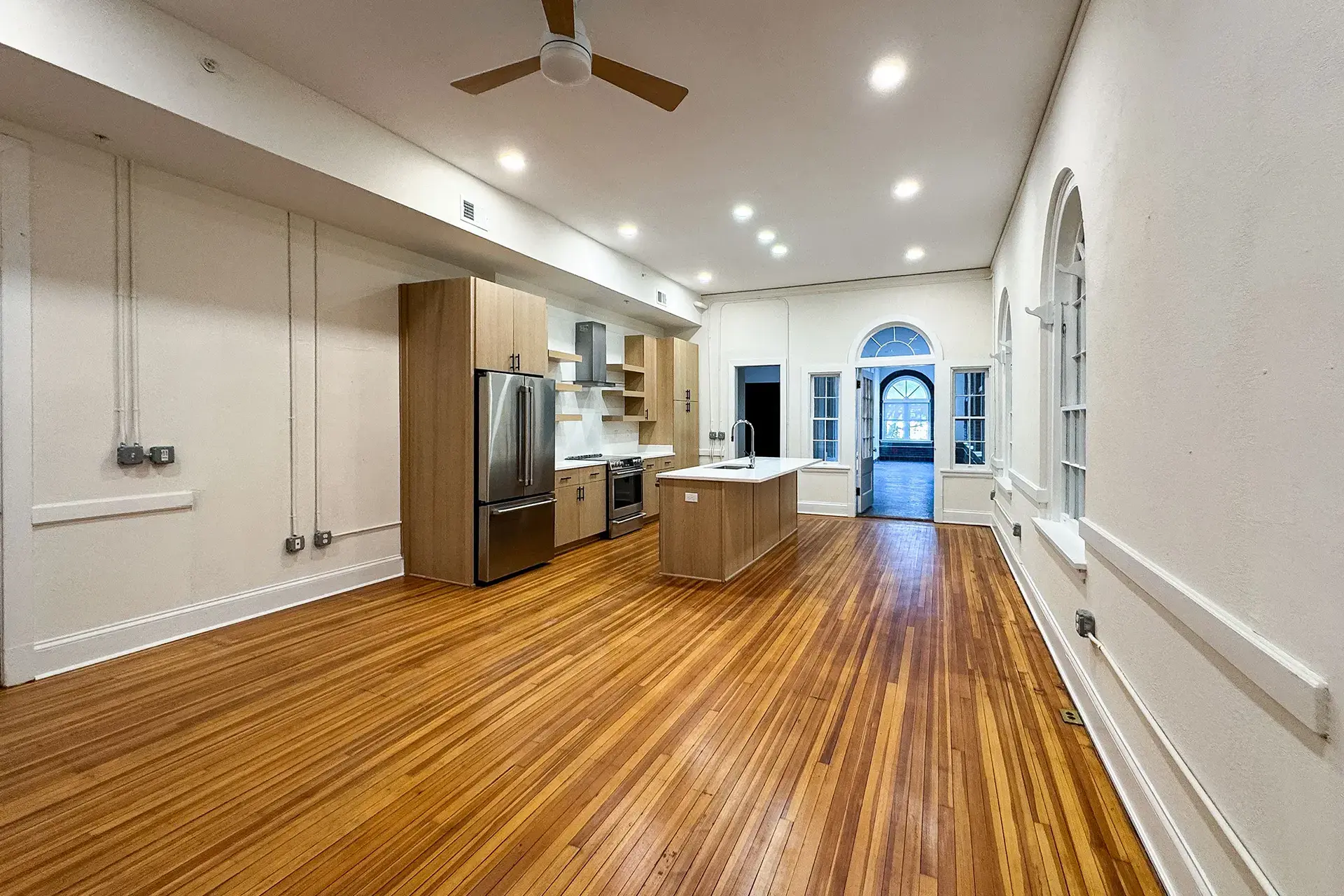 The Abby condominium living room shot from corner looking toward the kitchen