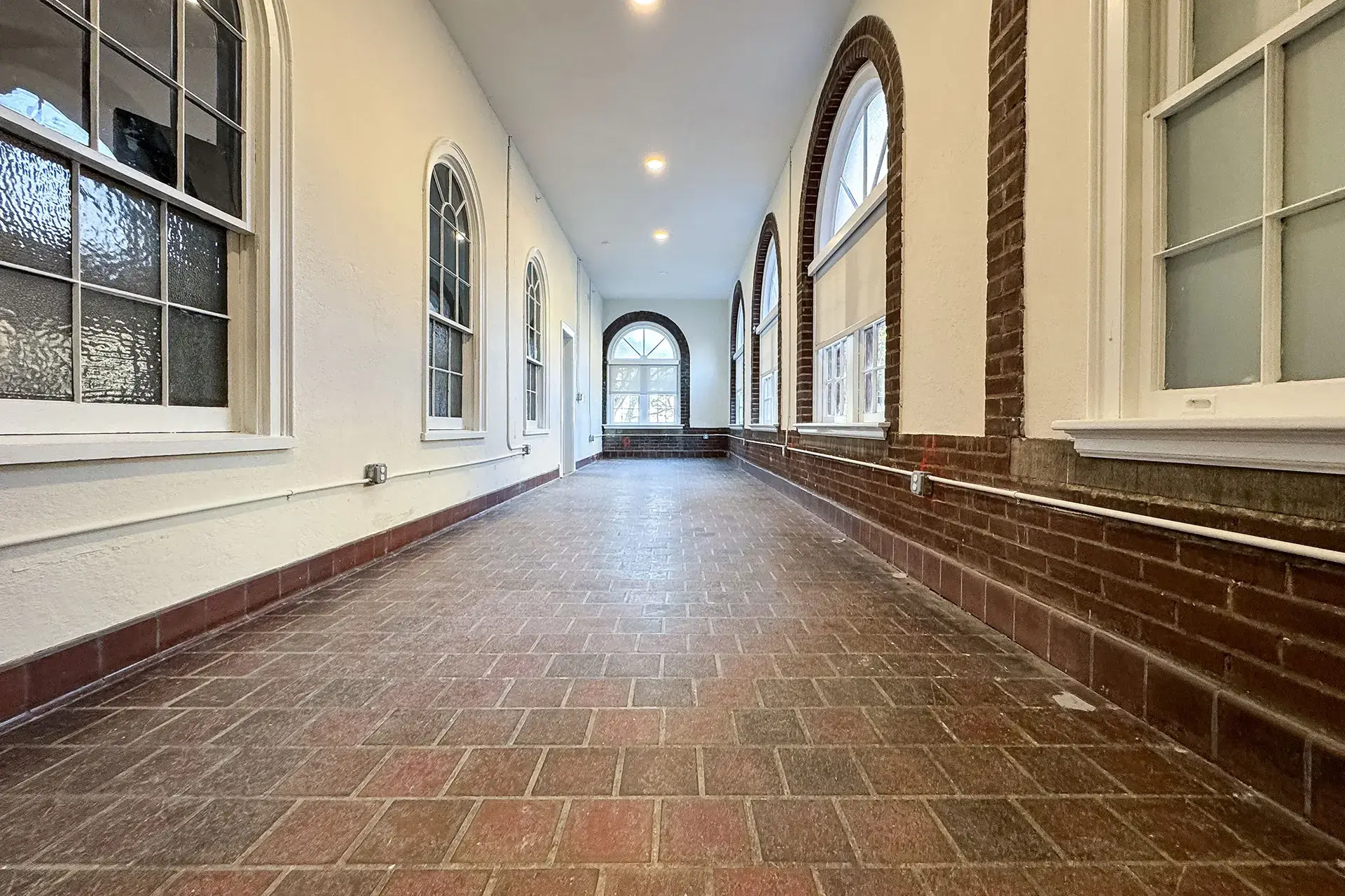 The Abby hallway with original brick