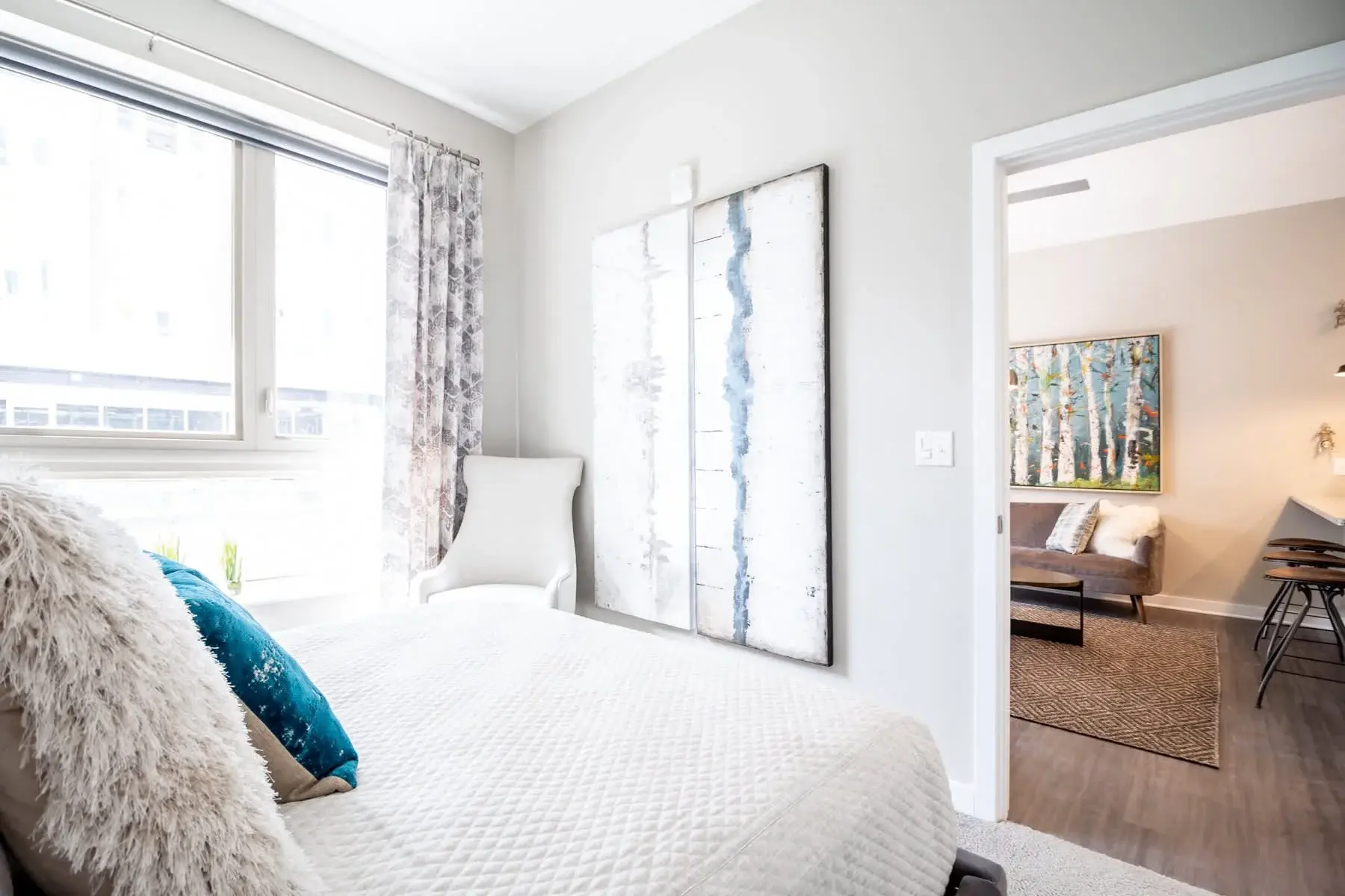 The Penny at Jackson Ward view if bedroom looking into living room