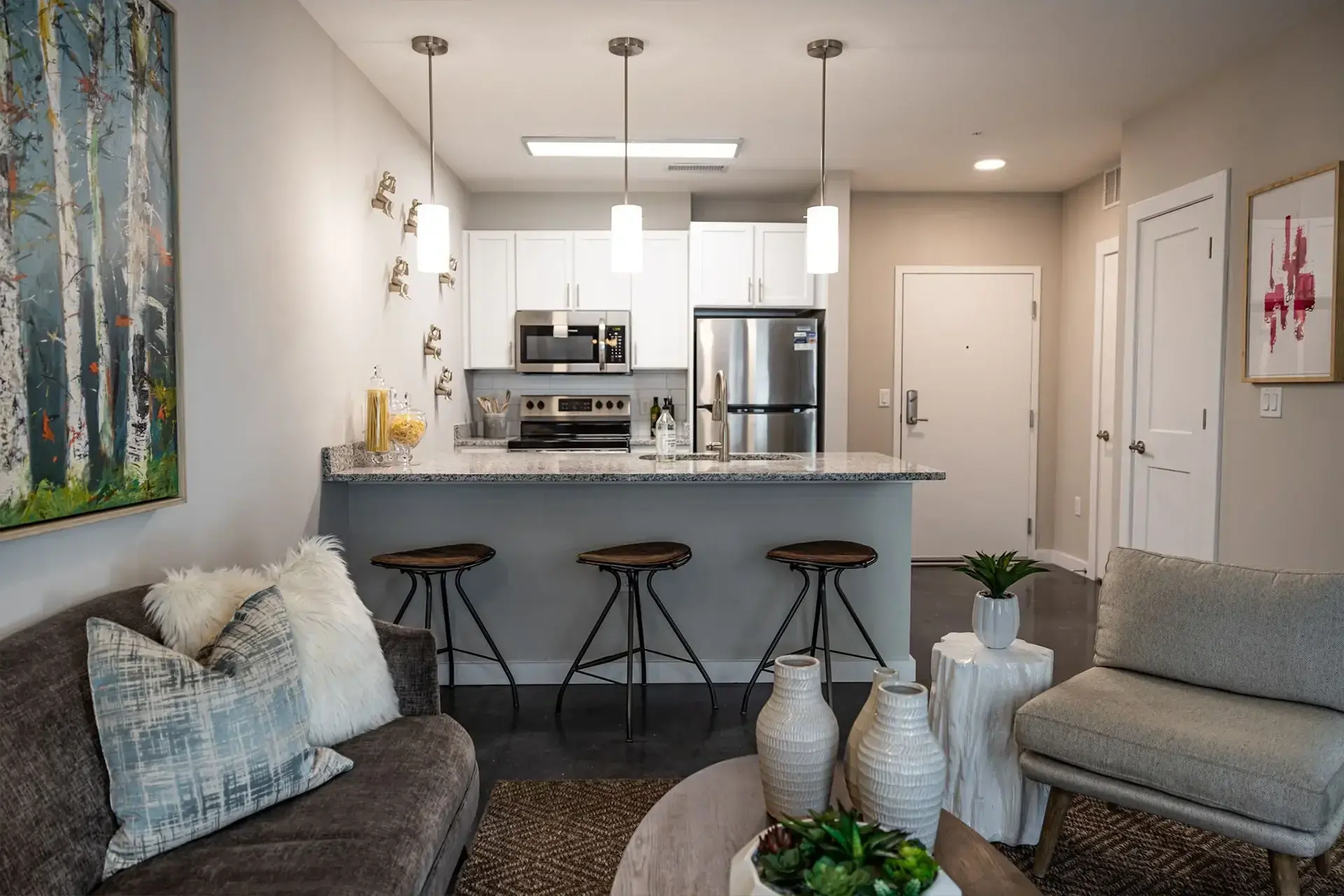 view of kitchen from living area in condo at The Summit
