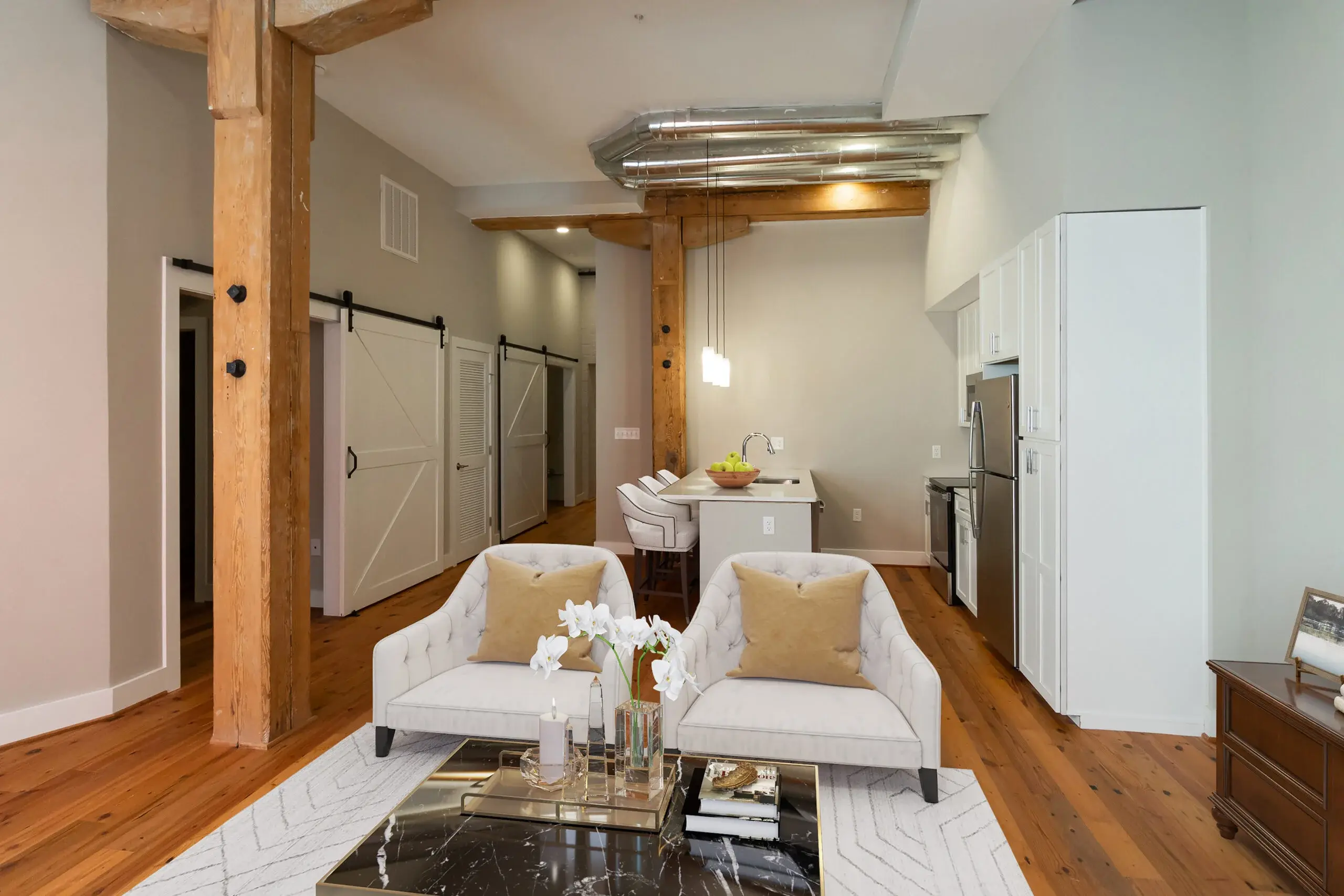 The Watkins condominium living room facing the kitchen
