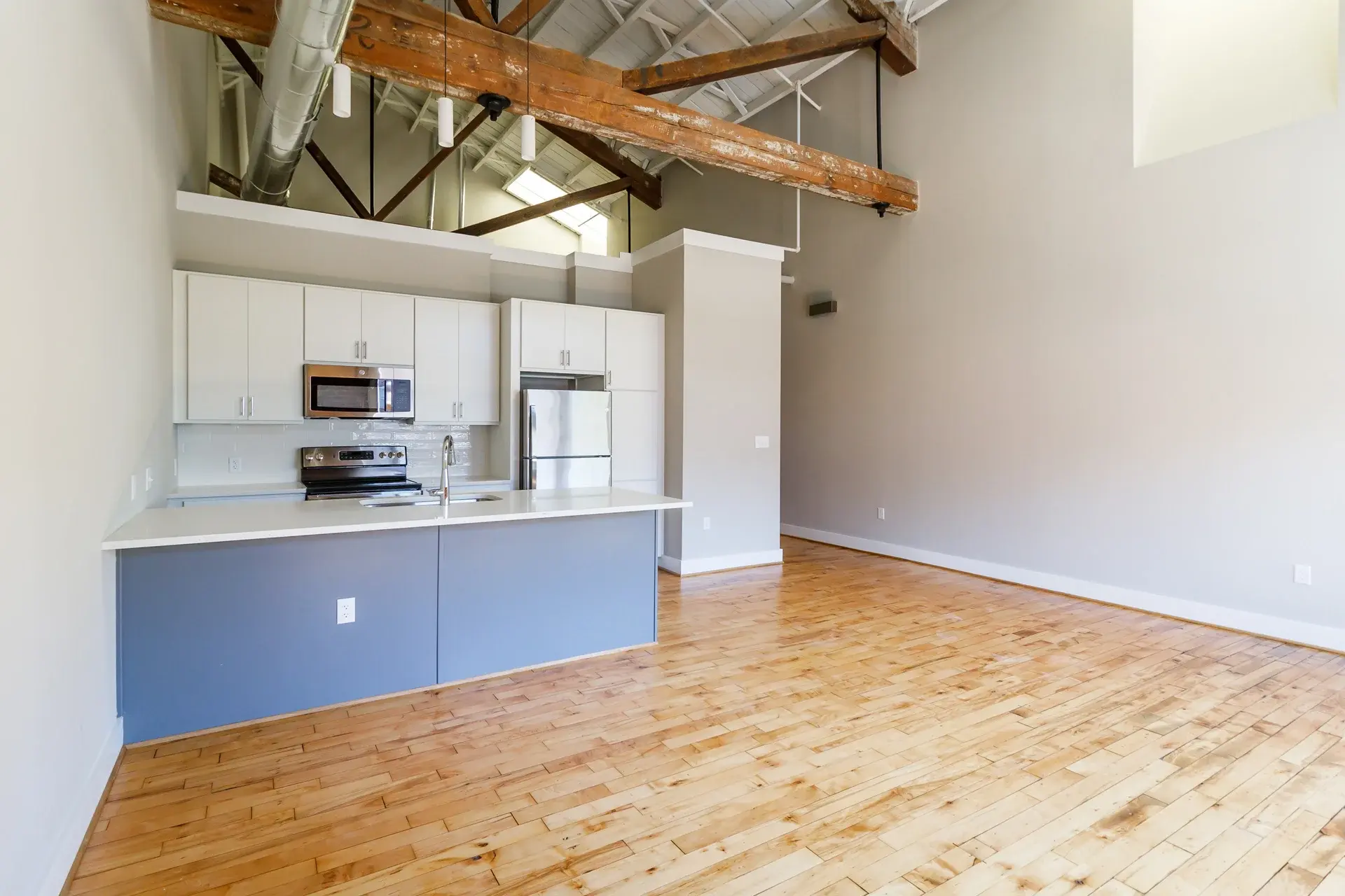 Modern kitchen with exposed wooden beams at The Watkins
