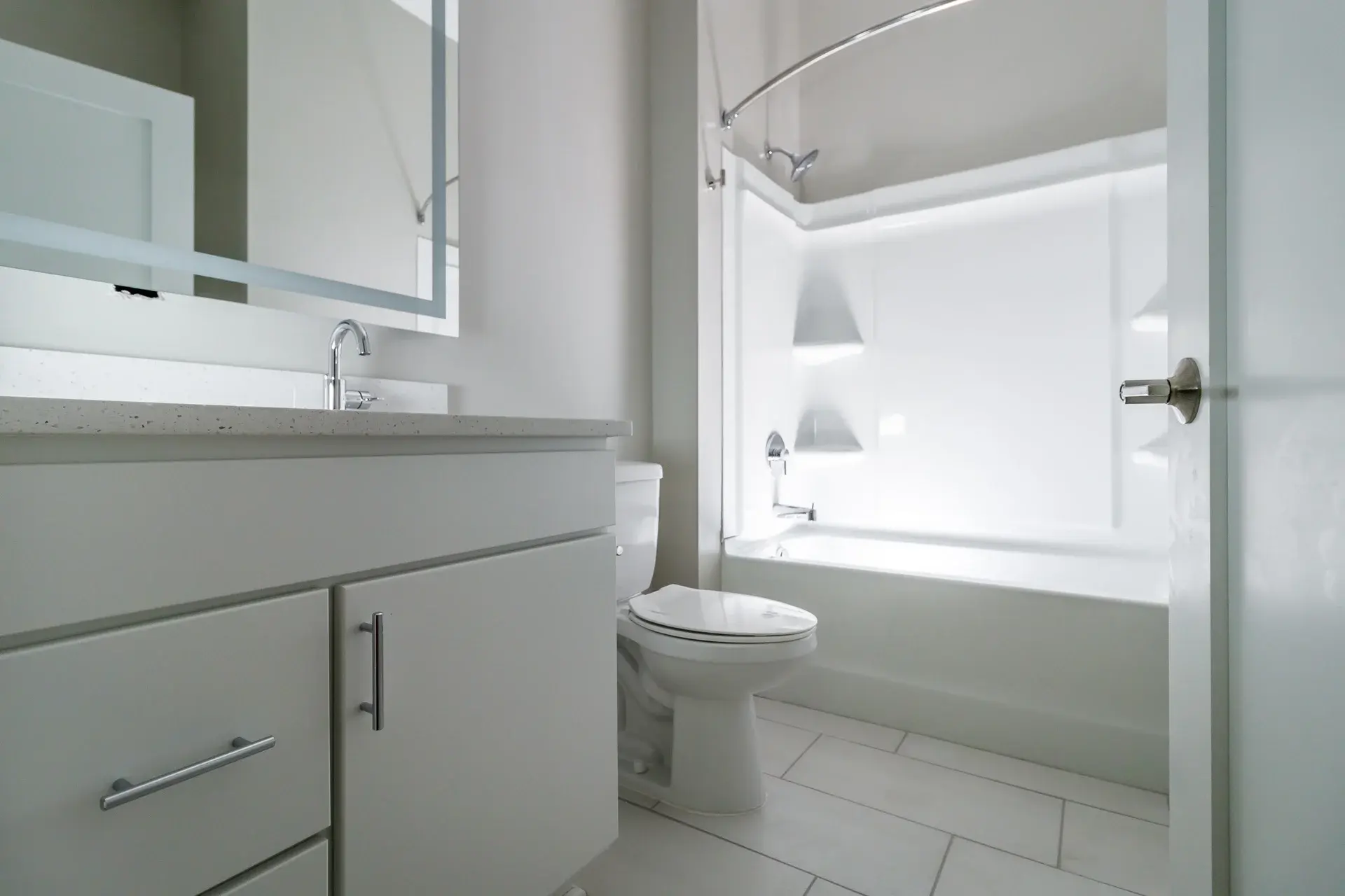 All white bathroom in a condo at The Watkins