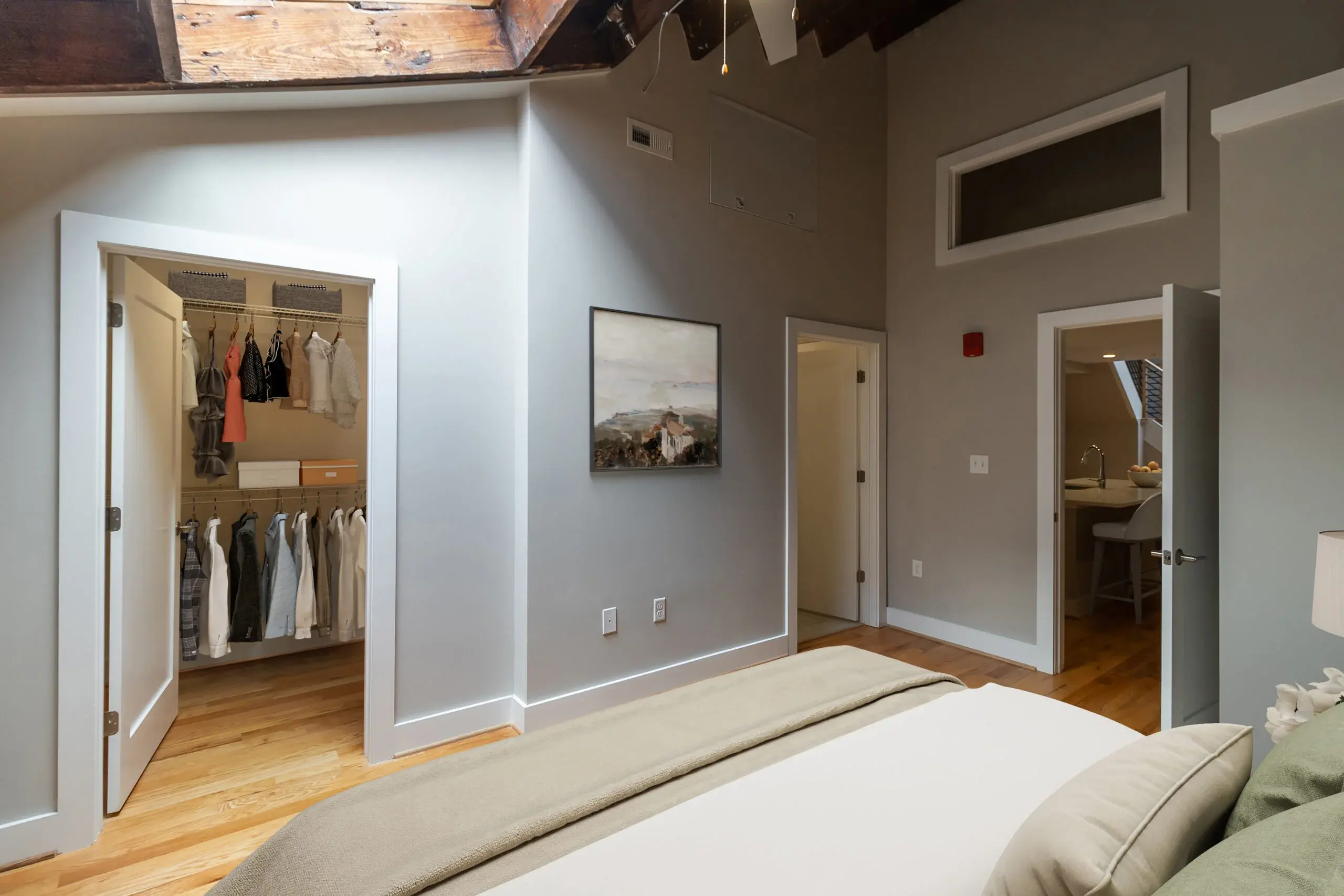 The Watkins condominium bedroom with exposed closet